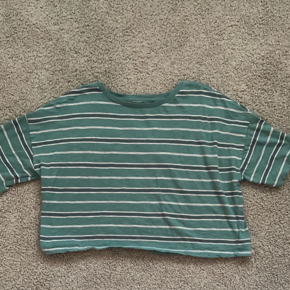 green white and pink short sleeve shirt
